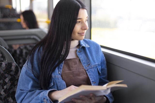 medium-shot-woman-holding-book